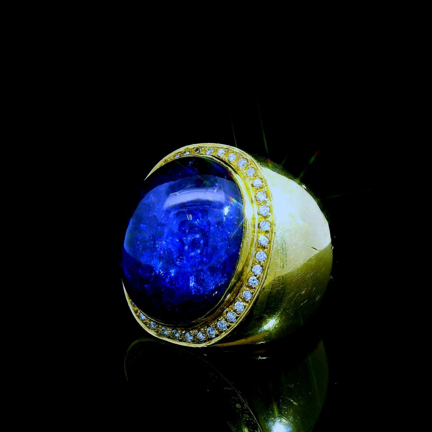 52.65 Purpul Tanzanite & 0.42cttw. White Diamonds in 18k Yellow Gold 11US