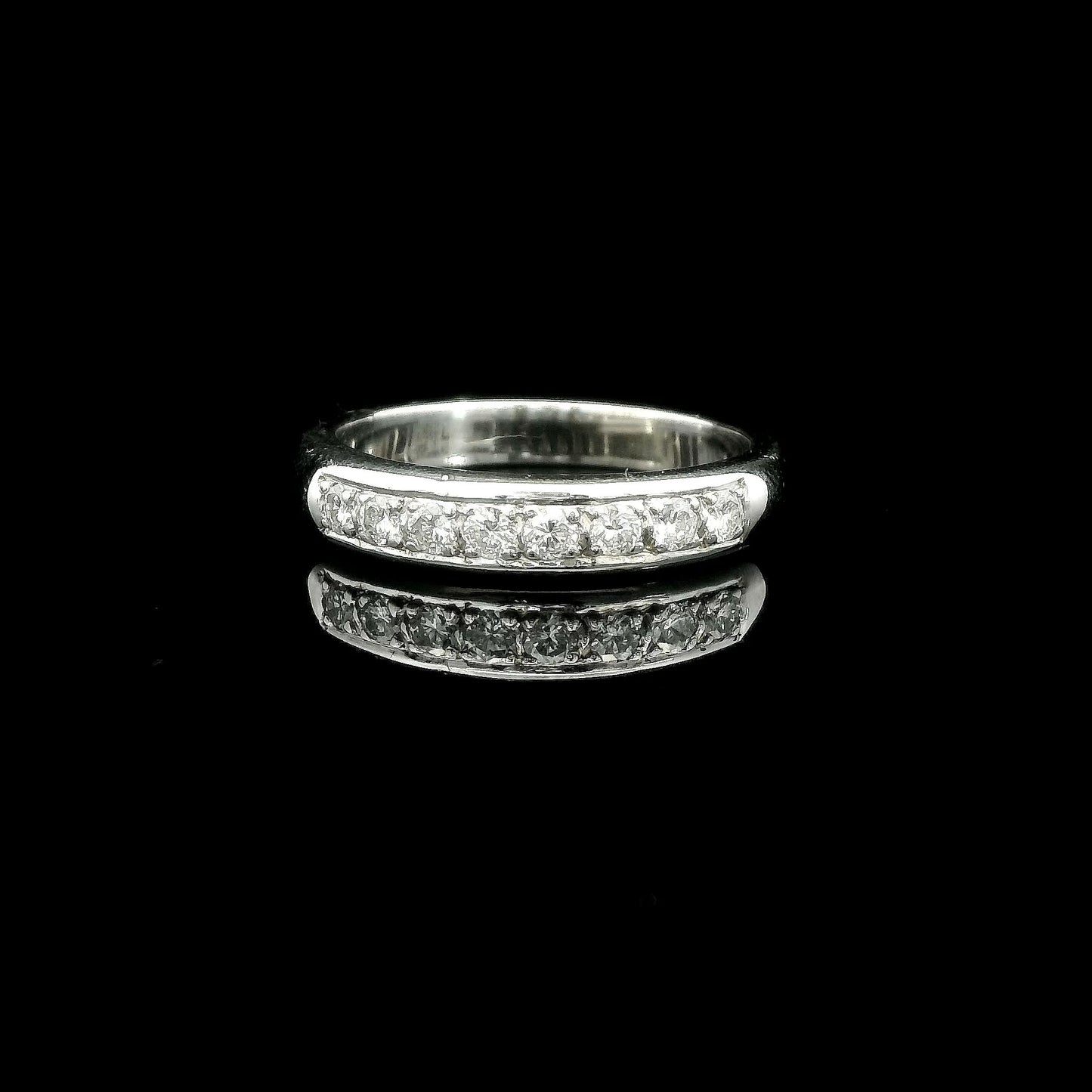 0.22cttw. White Diamond Channel Set Ring in 14k White Gold 3.35g. 6.5US