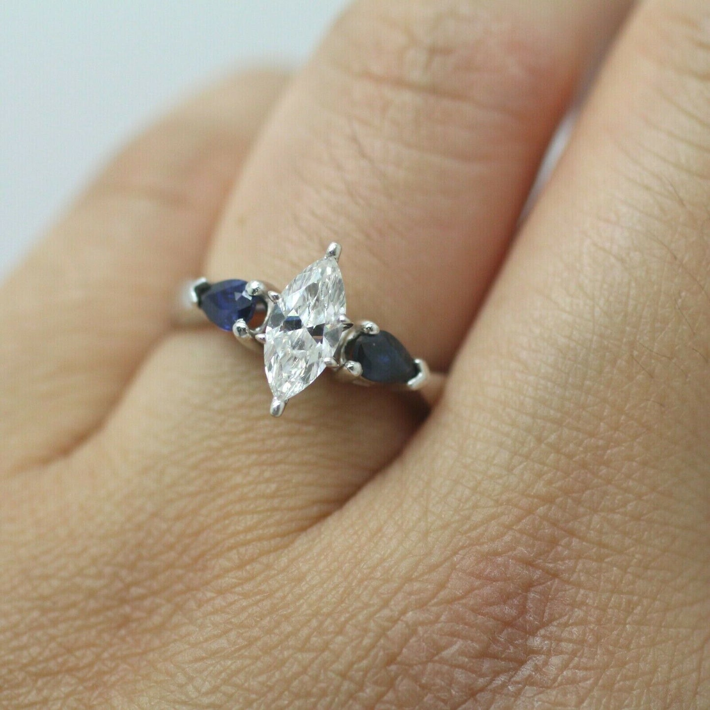 Marquise Diamond and Pearshaped Blue Sapphire Solitaire Ring in 14k White Gold