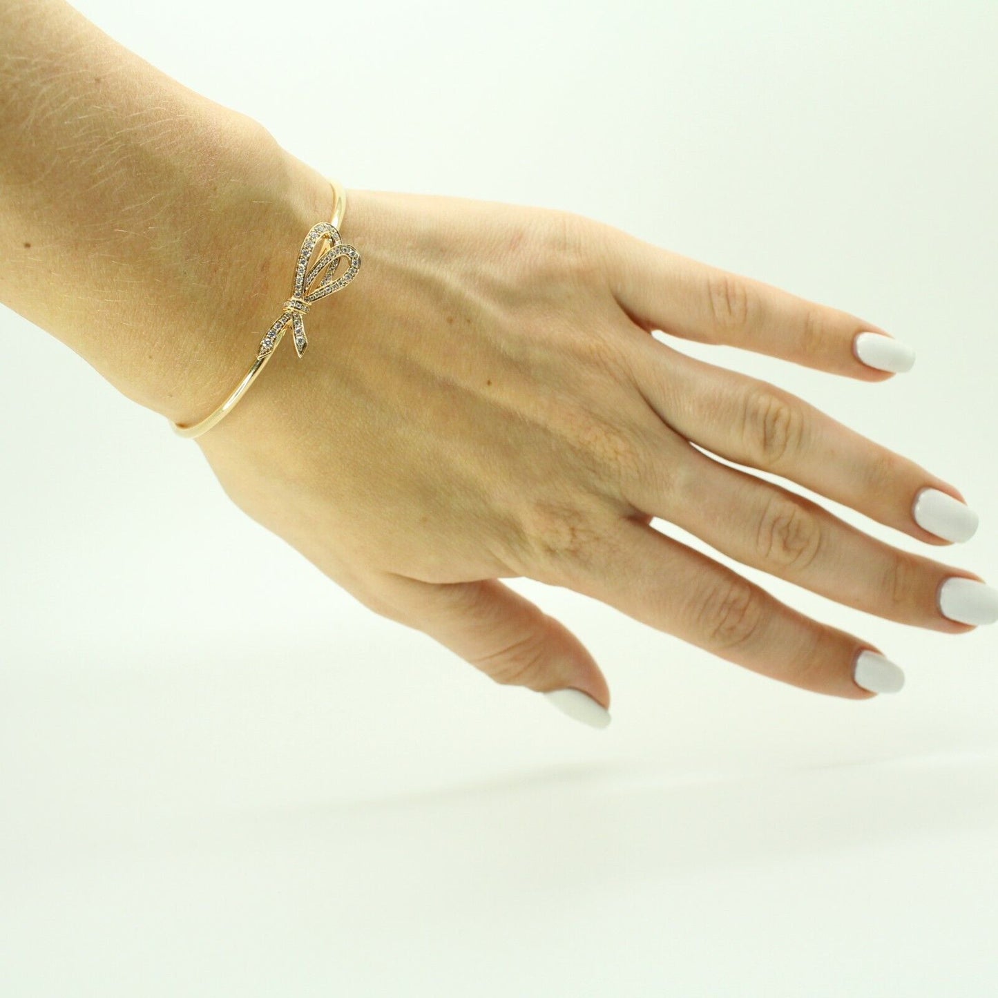 Authentic Tiffany and Co. 18k Yellow Gold Diamond Bow Cuff Bracelet Wire Bangle