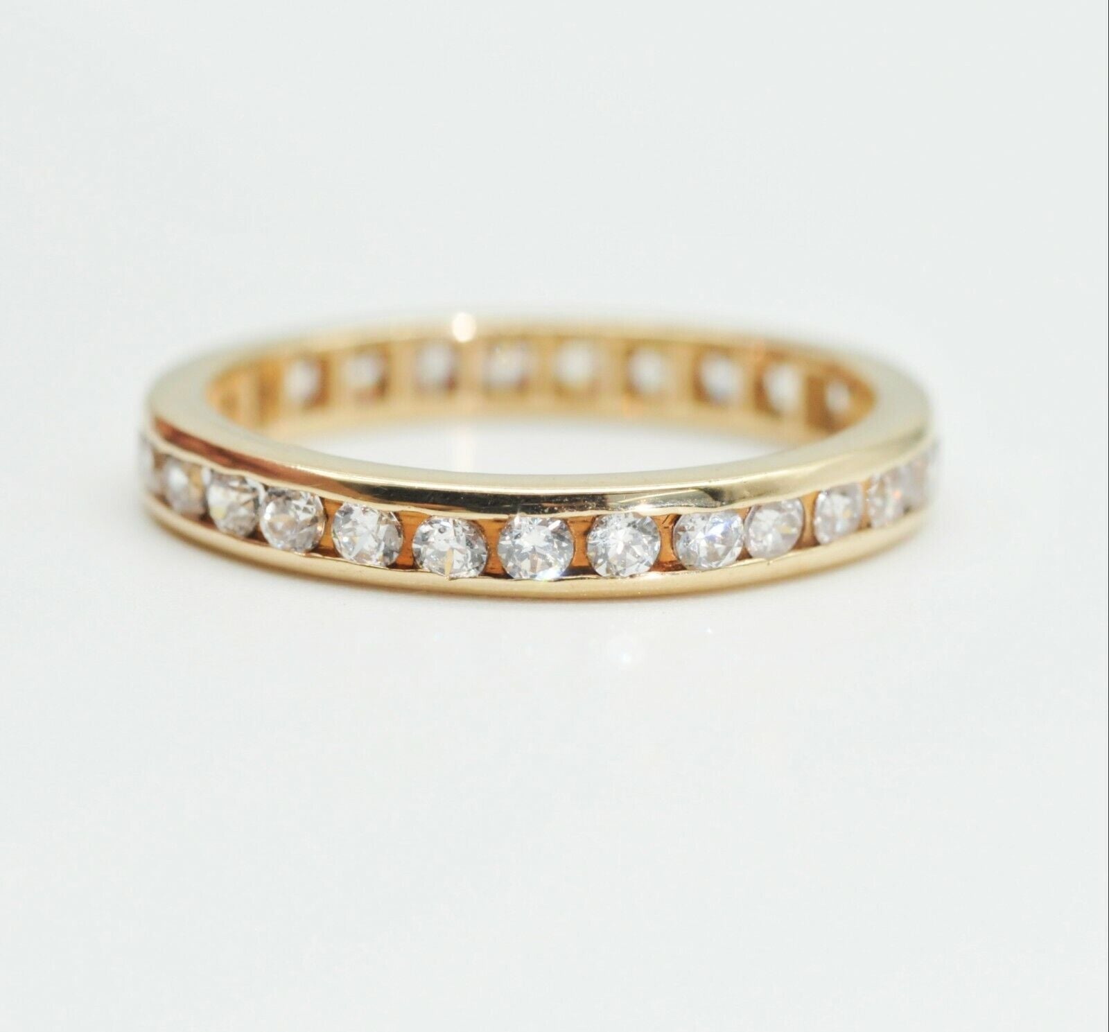 CZ Channel Setting Eternity Wedding Band Ring in 14k Yellow Gold 5.25us