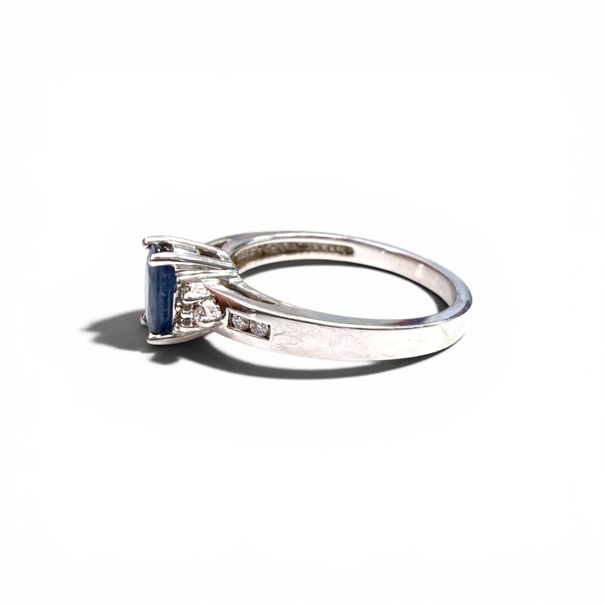 0.88ct Blue Sapphire & 0.09cttw. White Diamond Ring in 14k White Gold 7US