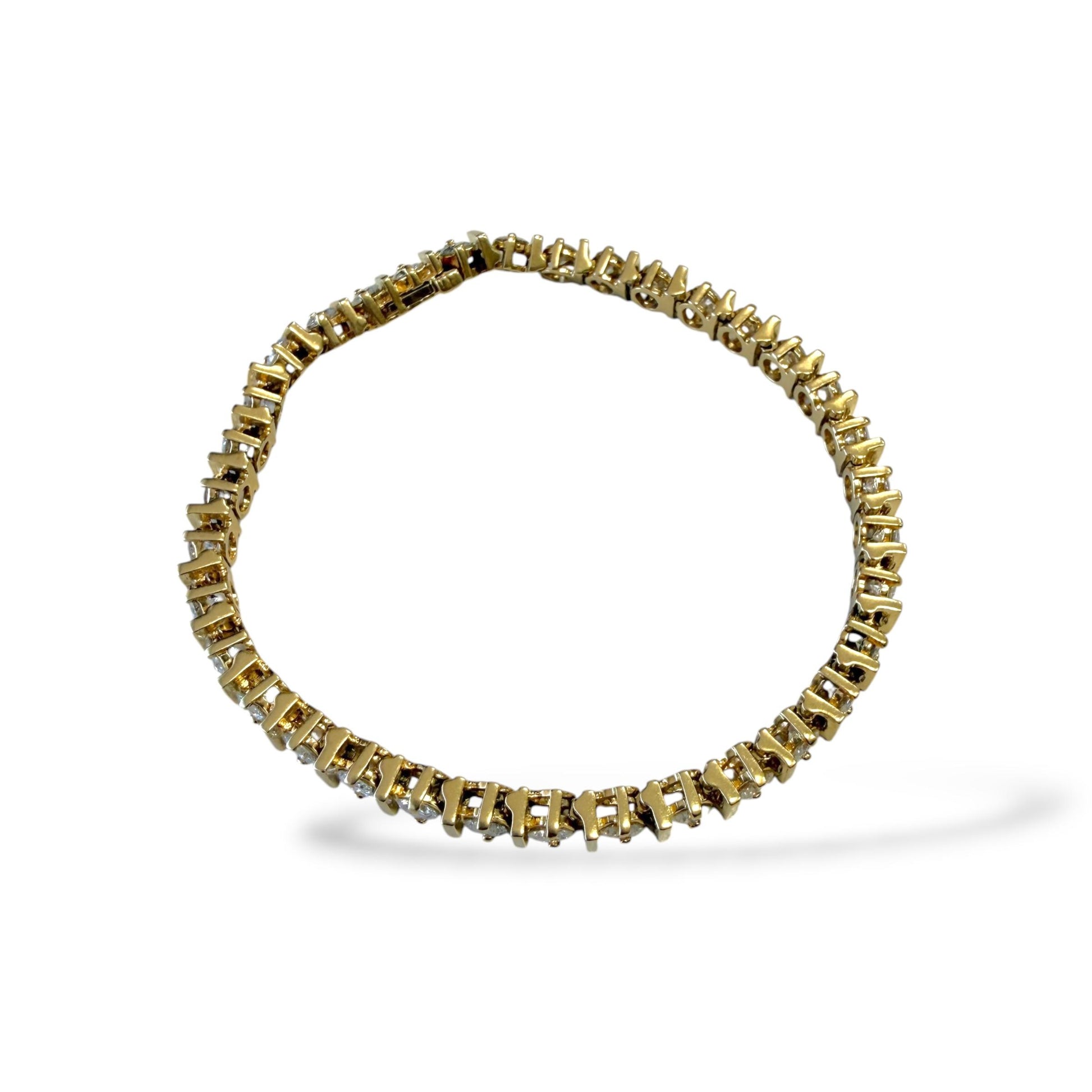Vintage 7cttw. White Diamonds Tennis Bracelet in 14k Yellow Gold 21.88g. 7.5"