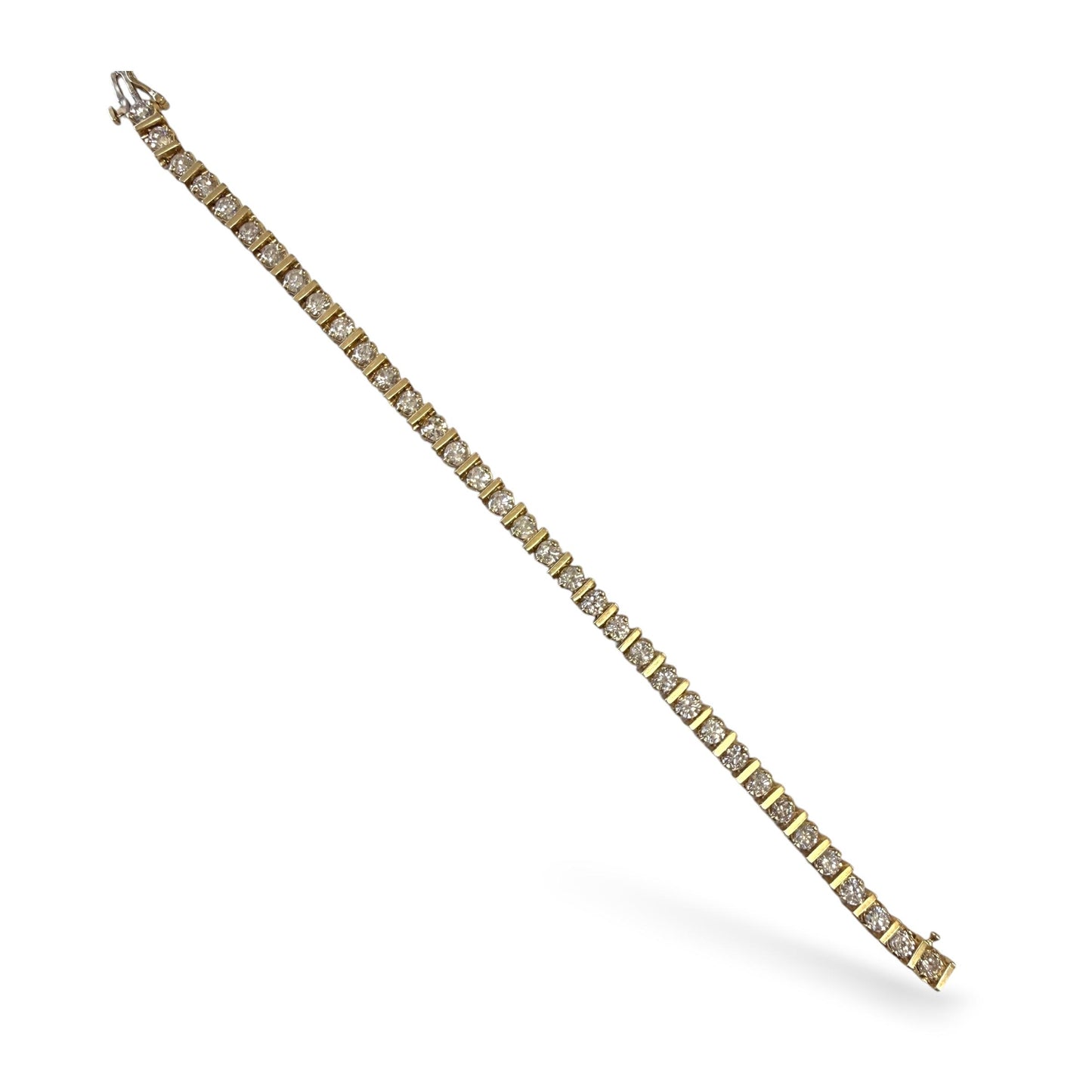 Vintage 7cttw. White Diamonds Tennis Bracelet in 14k Yellow Gold 21.88g. 7.5"