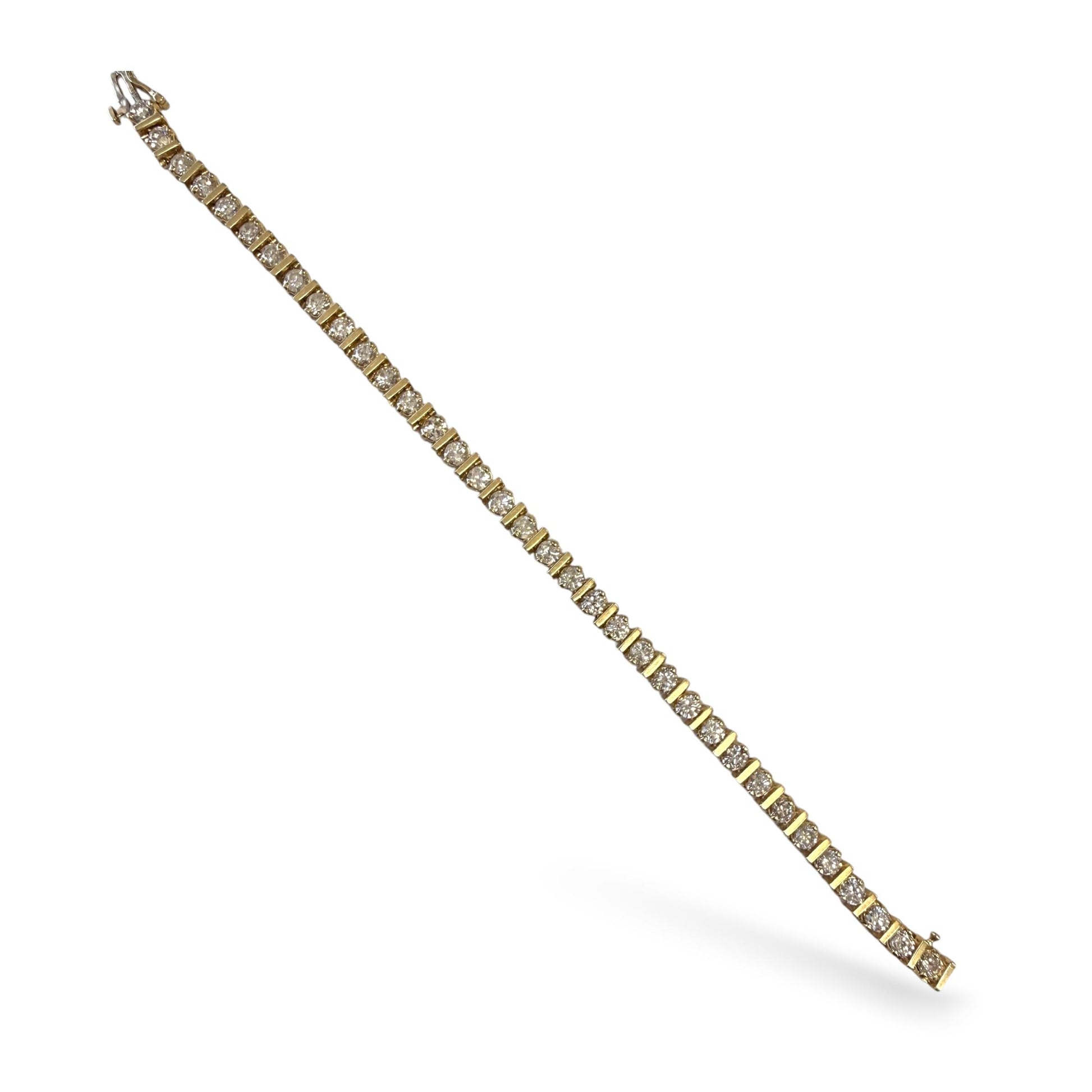 Vintage 7cttw. White Diamonds Tennis Bracelet in 14k Yellow Gold 21.88g. 7.5"
