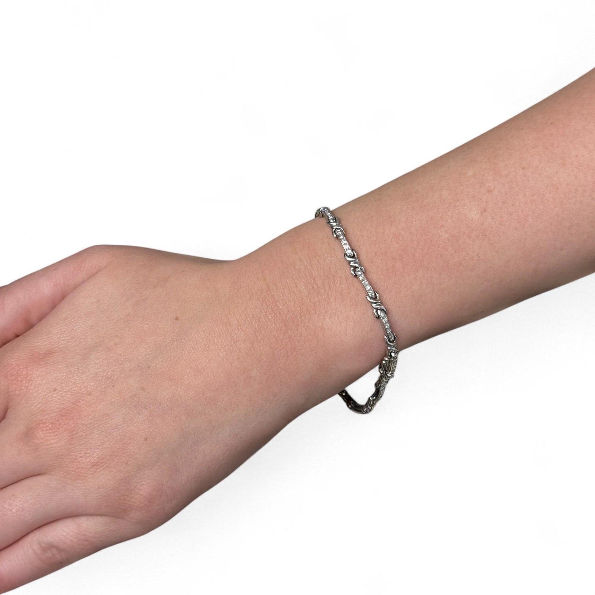 0.26cttw. White Diamond Bracelet in 18k White Gold  7.25inch 13.03g.