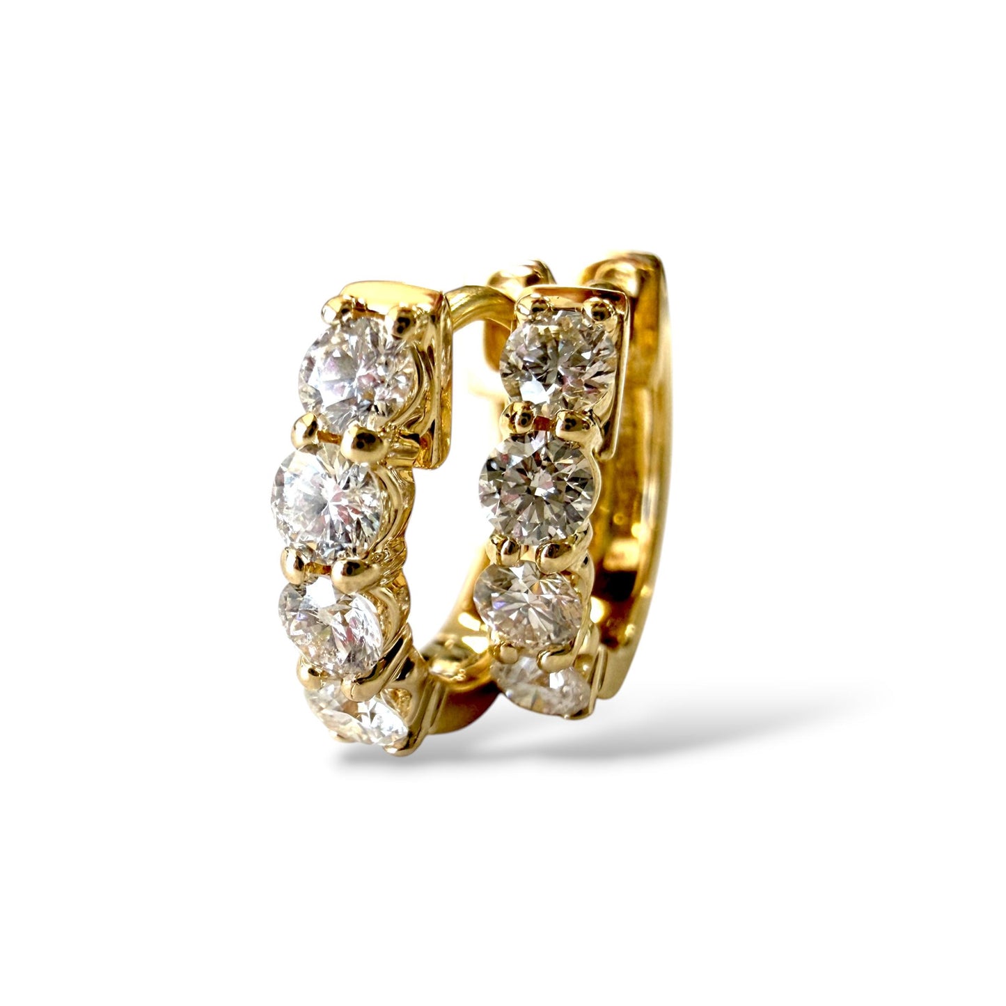 0.55cttw. White Diamond Huggies Earrings in 14k Yellow Gold 2.5g.