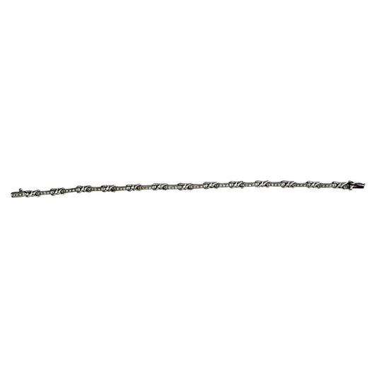 0.26cttw. White Diamond Bracelet in 18k White Gold  7.25inch 13.03g.