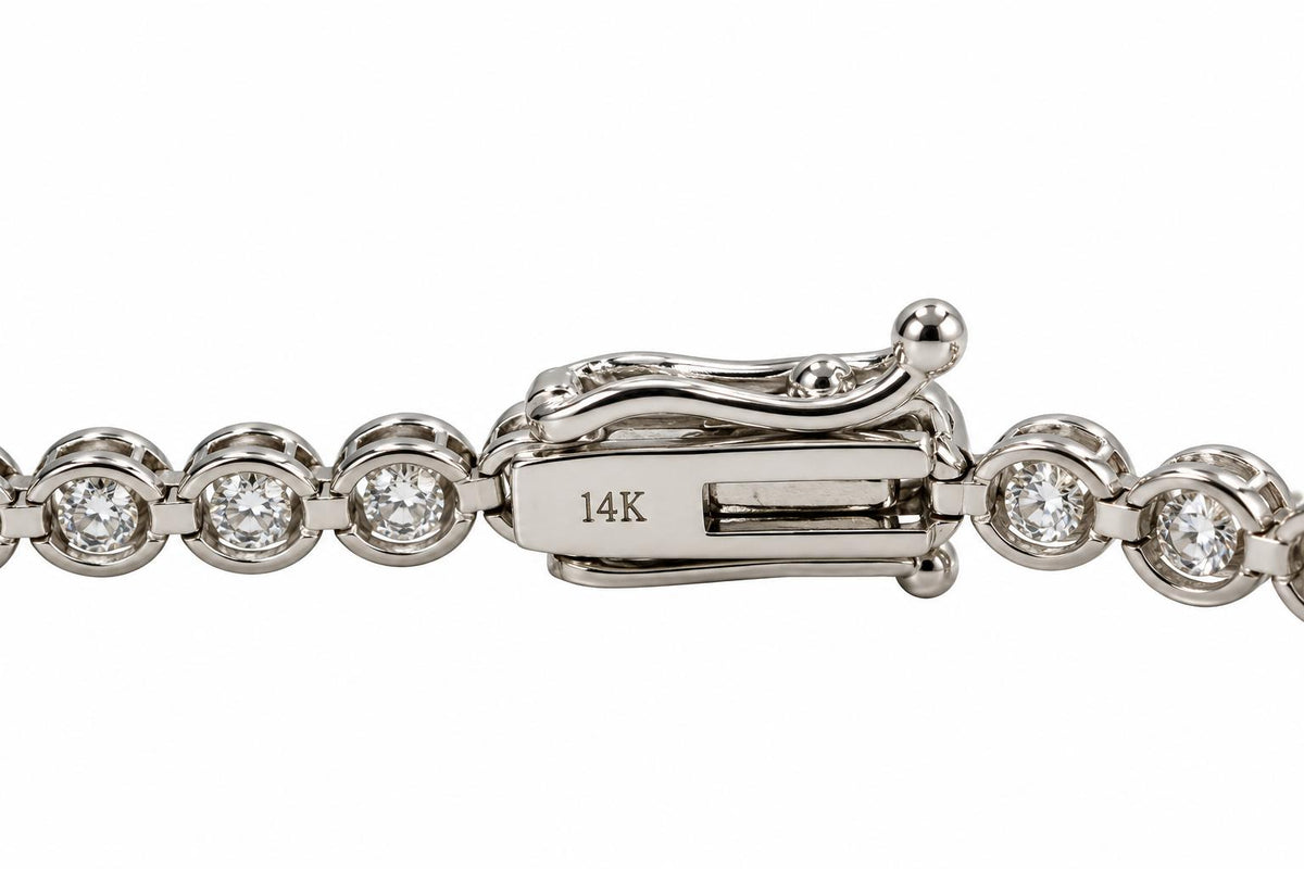 6.42cttw. White Diamond Bezel Set Tennis Bracelet in 14k White Gold 8.68g. 7"