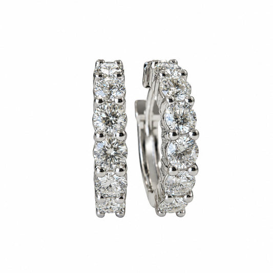 1.18cttw. White Diamond Hoop Earrings in 14k White Gold 3.84g.
