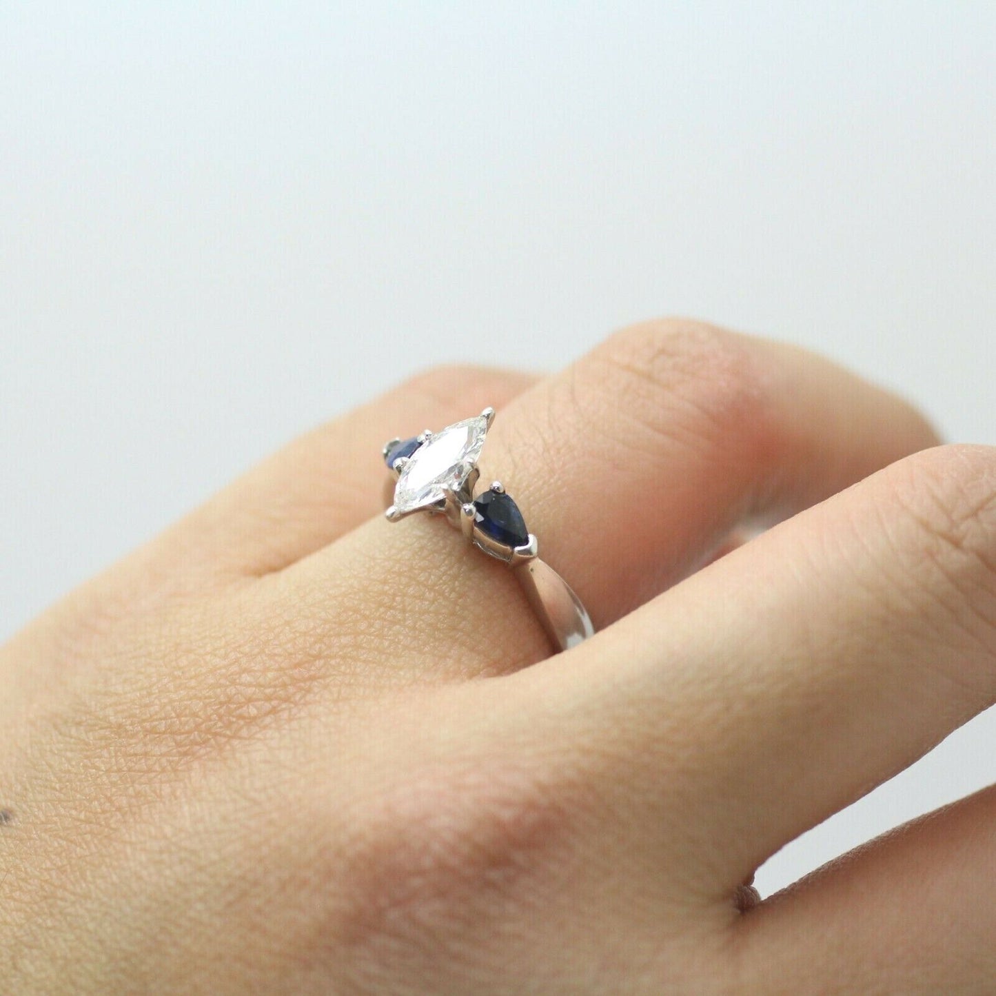 Marquise Diamond and Pearshaped Blue Sapphire Solitaire Ring in 14k White Gold